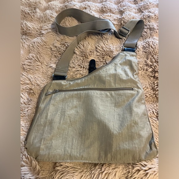 Tan athletic type nylon crossbody bag with tons of pockets - Picture 3 of 4